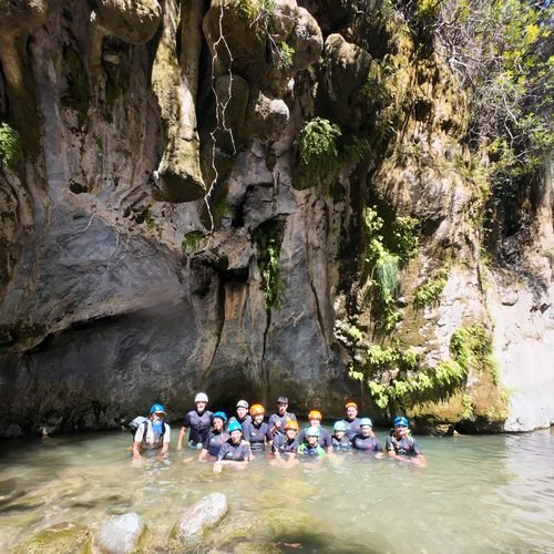 Group in a natural canyon pool